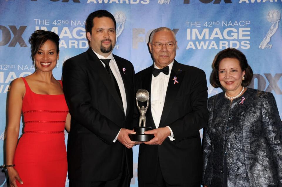 (L-R) Lisa Epperson Jealous, NAACP President and CEO Benjamin Todd Jealous, former U.S. Secretary of State Colin Powell, winner of the President’s Award, and Alma Powell pose in the press room at the 42nd NAACP Image Awards held at The Shrine Auditorium on March 4, 2011 in Los Angeles, California. (Photo by Jason Merritt/Getty Images)