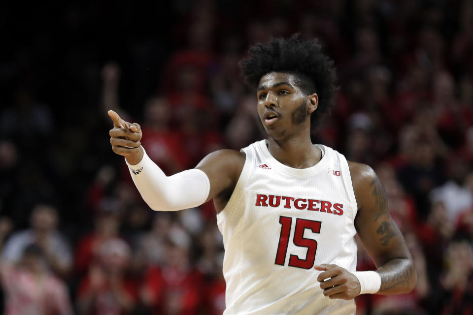 Rutgers center Myles Johnson (15) reacts after making a basket during the first half of an NCAA college basketball game against Nebraska on Saturday, Jan. 25, 2020, in Piscataway, N.J. (AP Photo/Adam Hunger)