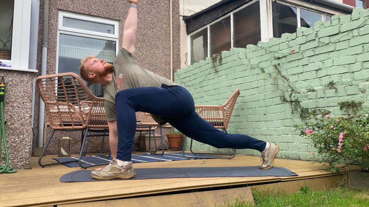  Fit&Well fitness writer Harry Bullmore doing the world's greatest stretch. 