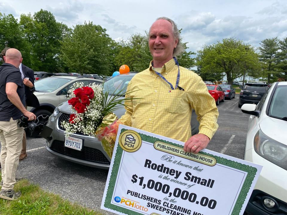 Rodney Small of Chambersburg, a personal care assistant at Franklin Learning Center, received a giant check for the $1 million he won in the Publishers Clearing House Lotto outside the Chambersburg school for special needs students on May 16.