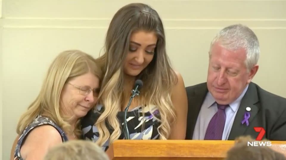 Best friend Rachel is consoled by Matthew Leveson's parents as she gives her eulogy. Source: 7 News