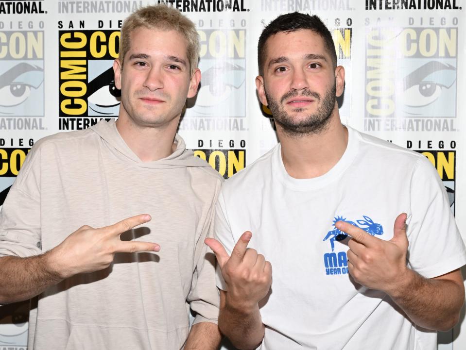 Danny and Michael Philippou pose for photos at San Diego Comic Con in July 2023.