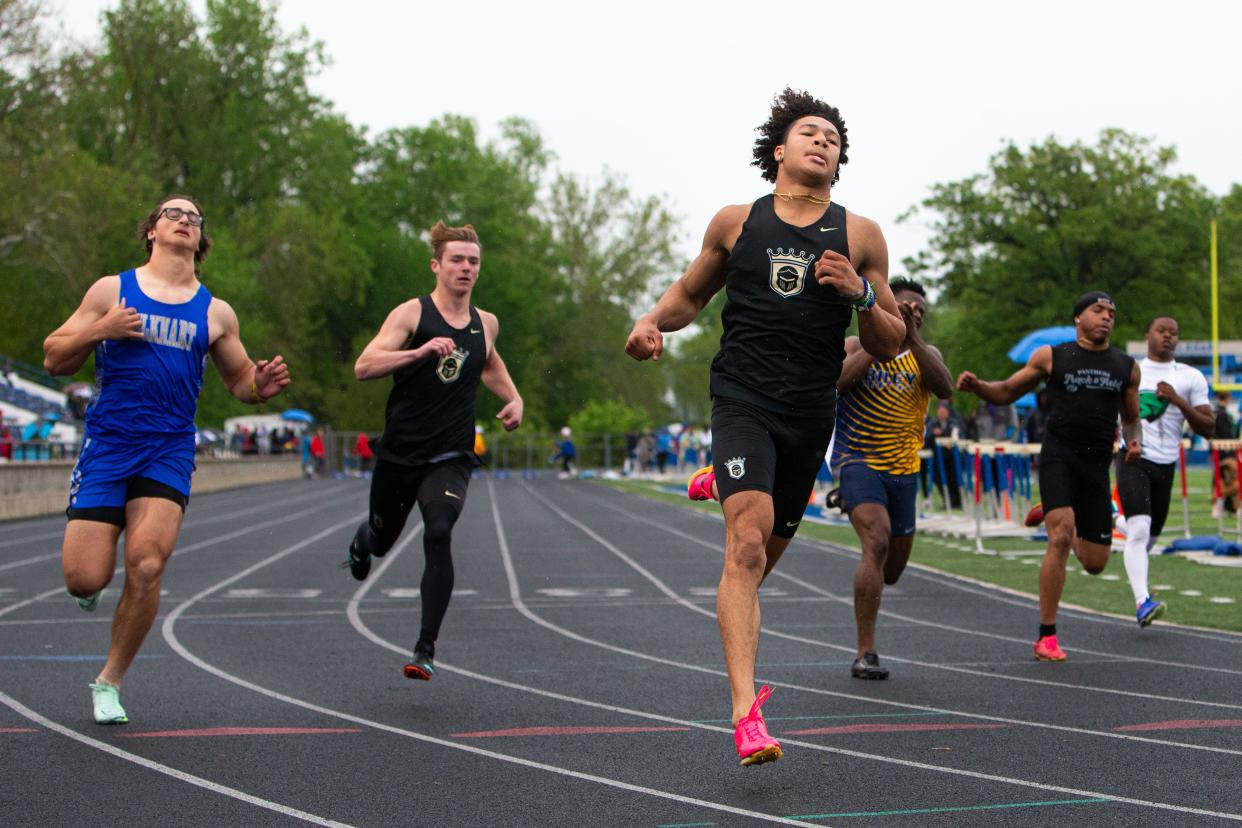 Penn High School's Elijah Coker, third from left, wins the 100 meter dash at a Northern Indiana Conference boys track and field meet on Thursday, May 9, 2024 at Elkhart High School.