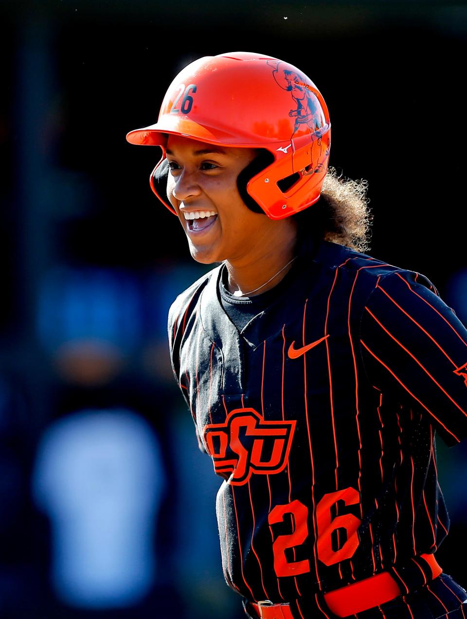 Oklahoma State's Morgyn Wynne (26) reacts during the Stillwater Regional in 2022 NCAA softball tournament game between Oklahoma State Cowgirls and University of North Texas (UNT) at Cowgirl Stadium in Stillwater, Okla., Sunday, May, 22, 2022. 