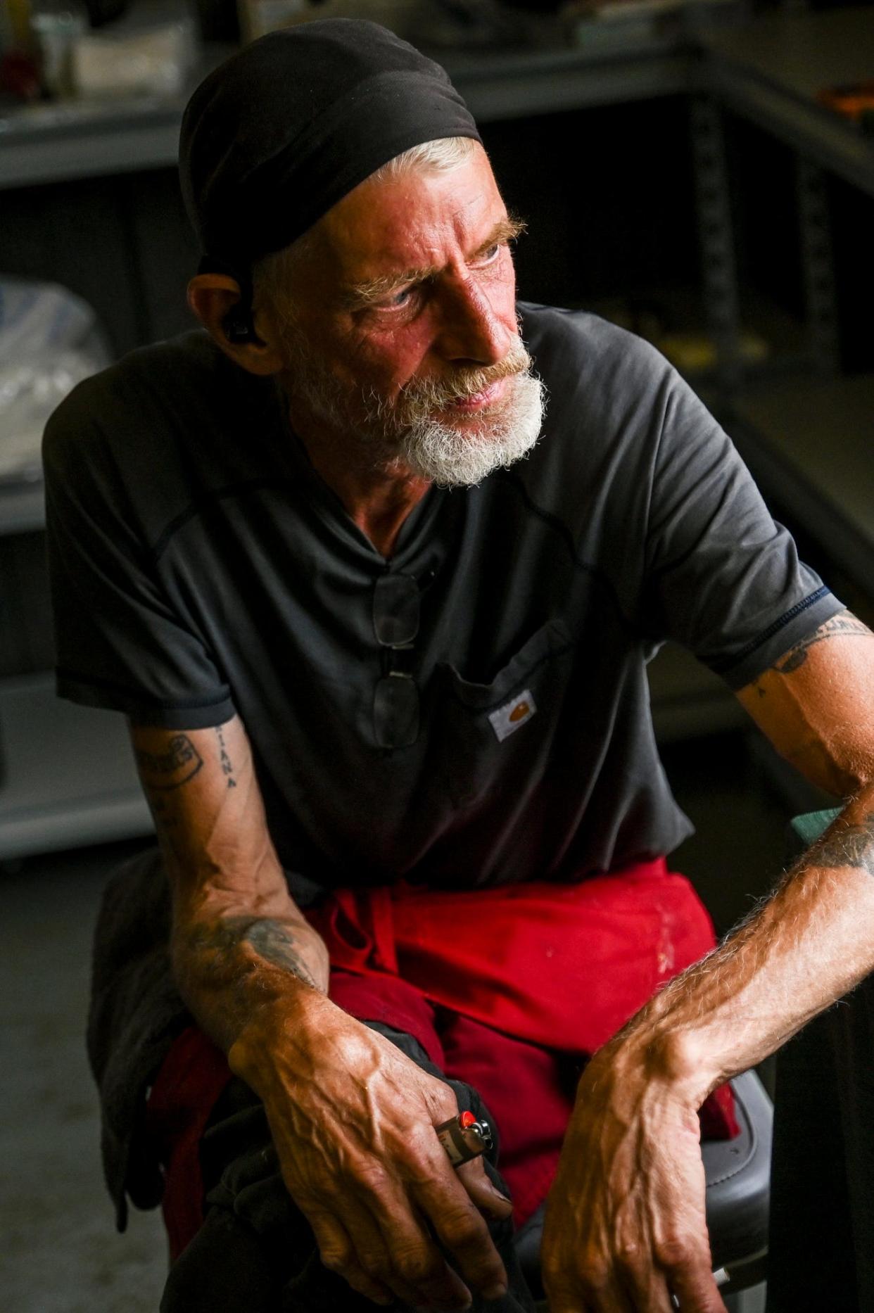 Truckin' Awesome owner Marty Martin, of Charlotte, looks out the window in the Olivet Community Resource Center that Martin runs on Monday, July 10, 2023, in Olivet. Martin died on Saturday.