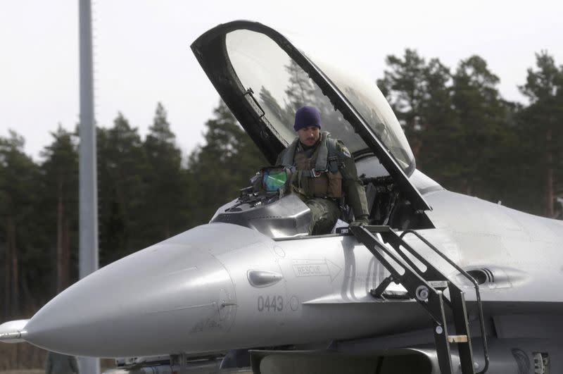 FILE PHOTO: U.S. Air Force 510th Fighter Squadron pilot leaves his F-16 fighter in Amari air base