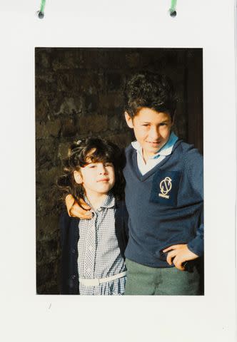 <p>Courtesy of HarperCollins</p> Picture of Amy and her older brother Alex Winehouse