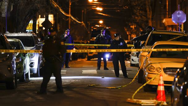 PHOTO: Philadelphia police officers investigate the fatal shooting of a Temple University police officer near the campus on Saturday, Feb. 18, 2023, in Philadelphia. (Yong Kim/The Philadelphia Inquirer via AP) (Yong Kim/AP)