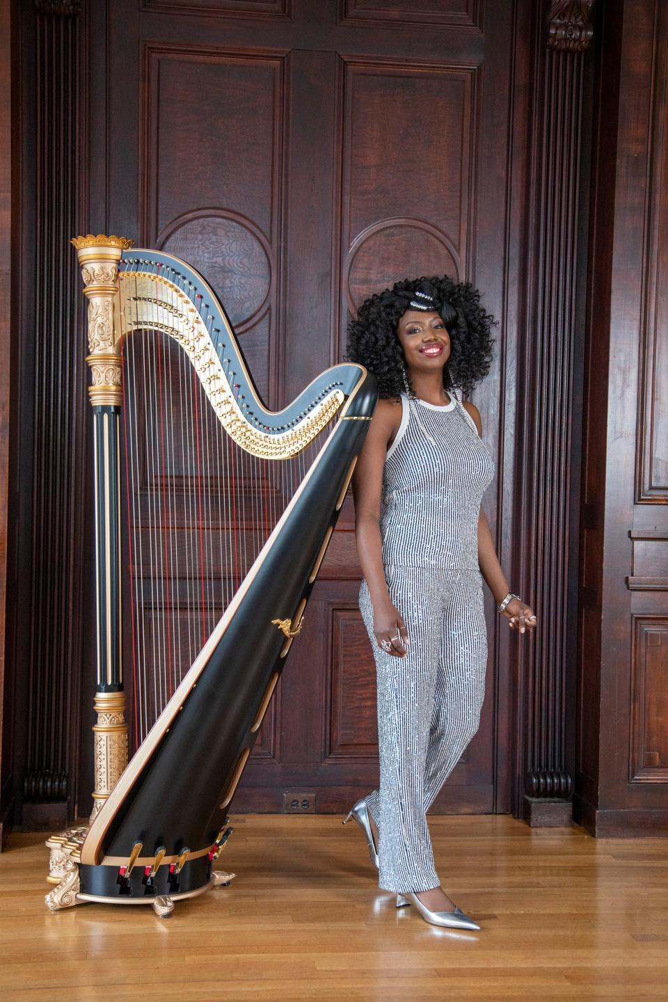 Grammy-nominated harpist Brandee Younger performs original and jazz music at Greaves Concert Hall on the campus of Northern Kentucky University on Thursday evening.