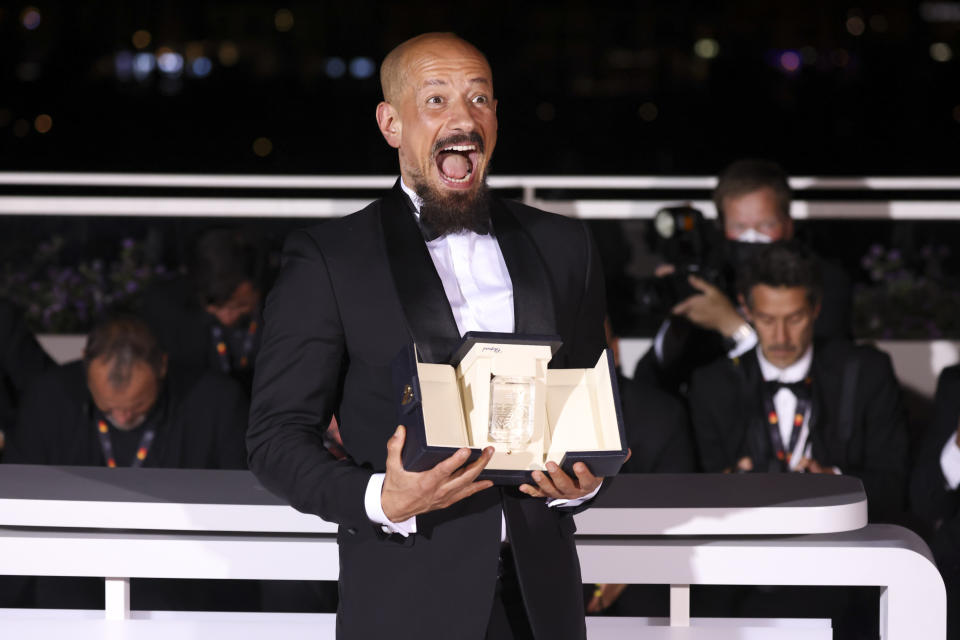 Writer/director Tarik Saleh, winner of the award for best screenplay for 'Boy from Heaven,' poses for photographers during the photo call following the awards ceremony at the 75th international film festival, Cannes, southern France, Saturday, May 28, 2022. (Photo by Vianney Le Caer/Invision/AP)