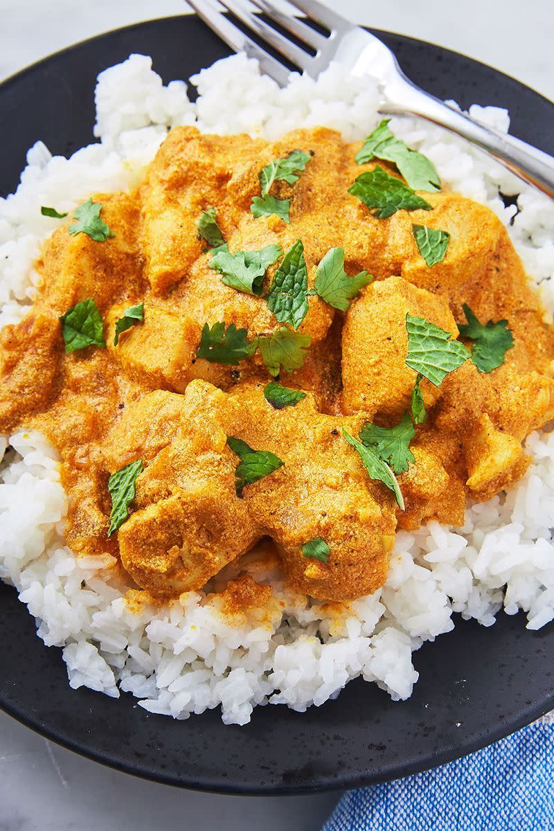 <p>This quick and easy coconut curry might be a bit untraditional, but trust us, it's delicious. Don't forget to whip up some rice to soak up all that saucy goodness. Check out our step-to-step guide on <a href="https://www.delish.com/uk/food-news/a28997170/how-to-cook-rice/" rel="nofollow noopener" target="_blank" data-ylk="slk:how to cook rice;elm:context_link;itc:0;sec:content-canvas" class="link ">how to cook rice</a> for the fluffiest rice ever. (Catch ya later, dry takeaway rice!)</p><p>Get the <a href="https://www.delish.com/uk/cooking/recipes/a30165274/easy-coconut-curry-chicken-recipe/" rel="nofollow noopener" target="_blank" data-ylk="slk:Coconut Chicken Curry;elm:context_link;itc:0;sec:content-canvas" class="link ">Coconut Chicken Curry</a> recipe.</p>