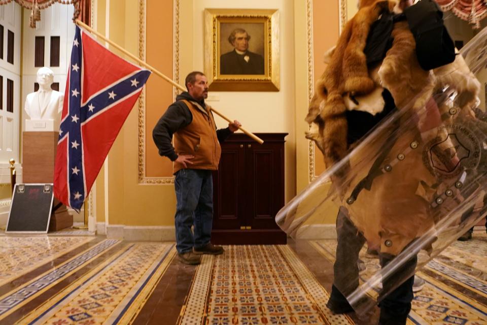 The Confederate flag flies inside the Capitol.