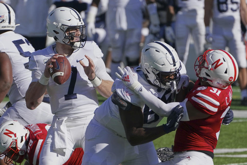 Penn State quarterback Will Levis (7) looks to throw as Penn State tight end Grayson Kline (89) blocks Nebraska linebacker Collin Miller (31) during the first half of an NCAA college football game in Lincoln, Neb., Saturday, Nov. 14, 2020. (AP Photo/Nati Harnik)