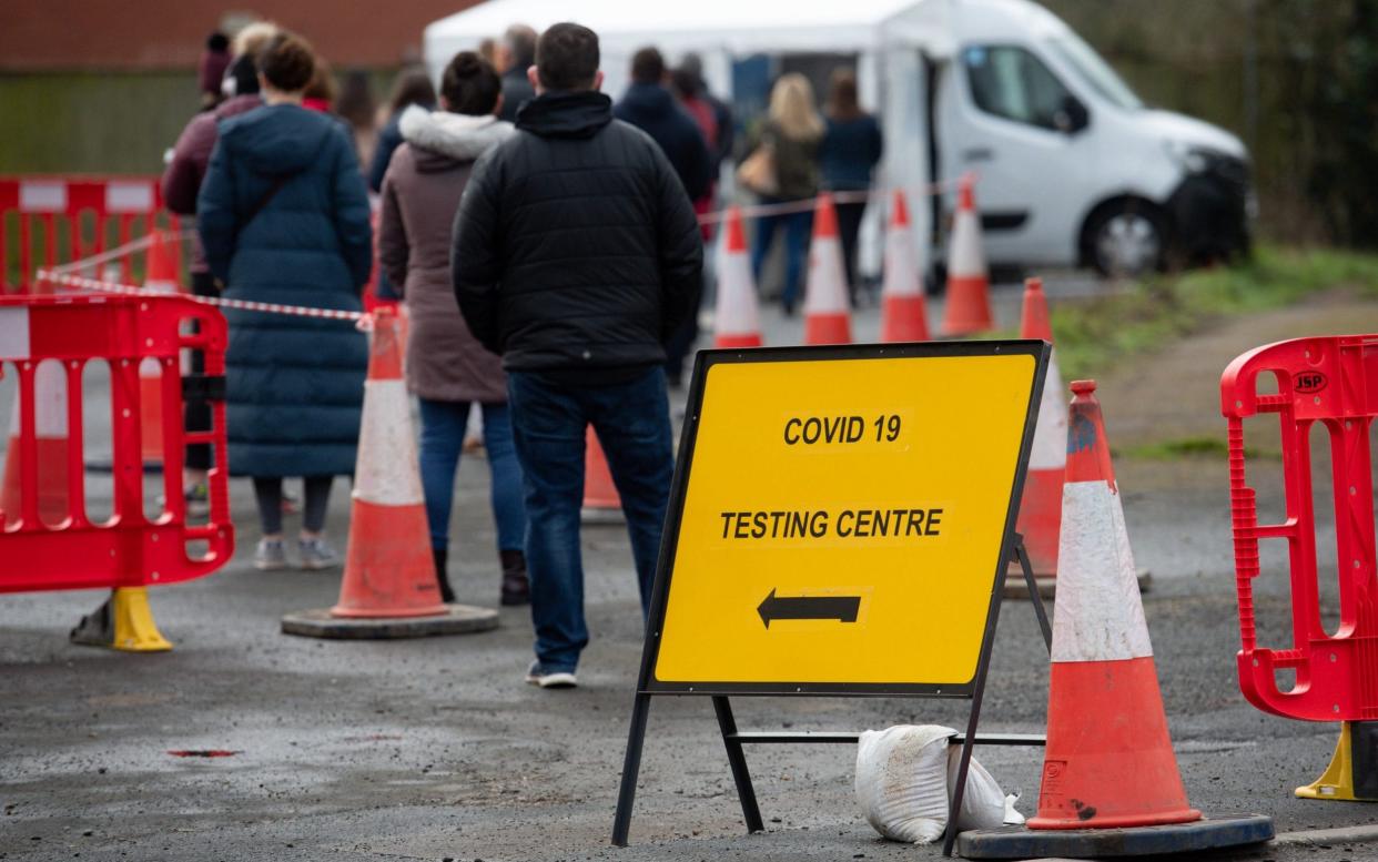 People in England are encouraged to take a Covid test if they have at least one of four 'classic' symptoms of the virus - Jacob King/PA