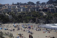 People visit Baker Beach during the coronavirus outbreak in San Francisco, Sunday, May 24, 2020. (AP Photo/Jeff Chiu)