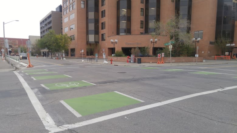 Cycle track on 8th Avenue spurs petition while city increases parking