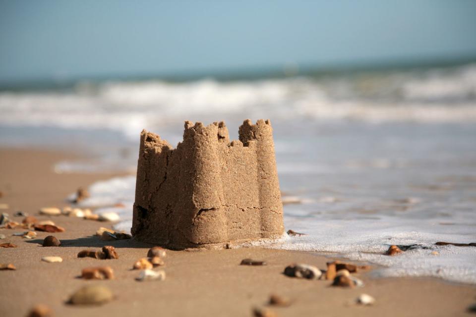 summer activities sand castle on a beach