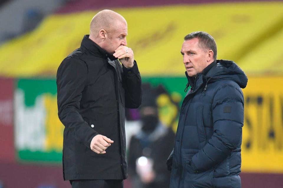 Sean Dyche (left) and his Burnley side take on Brendan Rodgers’ Leicester City  (POOL/AFP via Getty Images)