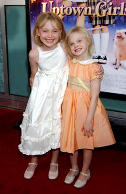 Dakota Fanning and sister Elle at the LA premiere of Uptown Girls