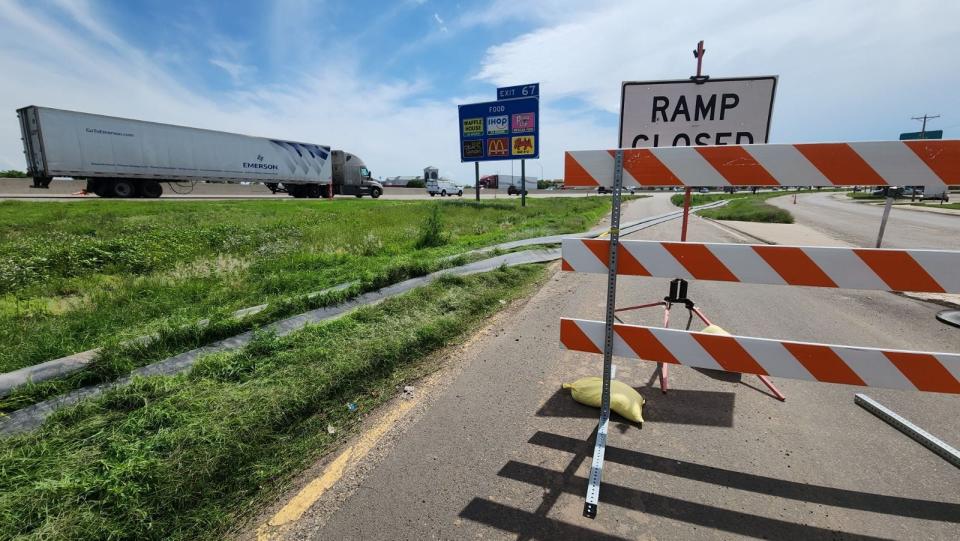 The Interstate-40 entrance at Paramount Boulevard is one of several road closures in Amarillo due to flooding on Friday.