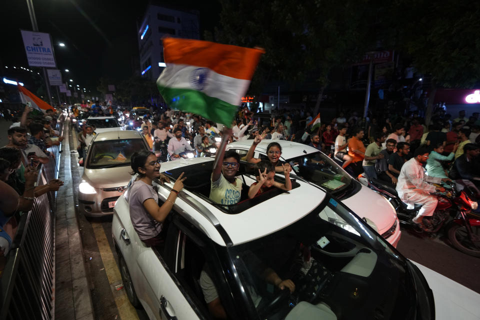 Cricket fans throng on streets to celebrate after India won the ICC Men's T20 World Cup final match against South Africa played at Barbados, in Ahmedabad, India, Sunday, June 30, 2024. (AP Photo/Ajit Solanki)