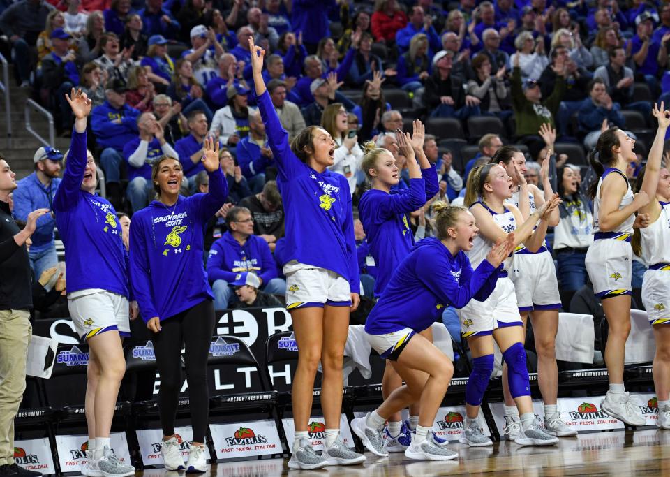 South Dakota State players celebrate a three-pointer during a game against Oral Roberts in the Summit League women’s semifinals on Monday, March 6, 2023, at the Denny Sanford Premier Center in Sioux Falls.