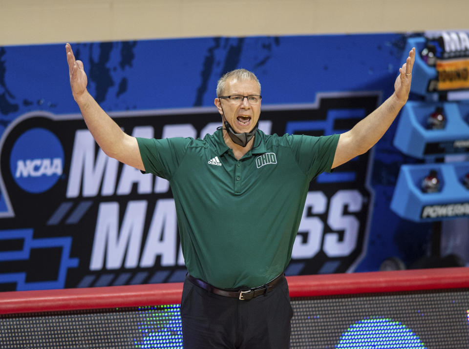 Ohio head coach Jeff Boals reacts to the action on the court during the first half of a first-round game against Virginia in the NCAA men's college basketball tournament, Saturday, March 20, 2021, at Assembly Hall in Bloomington, Ind. (AP Photo/Doug McSchooler)