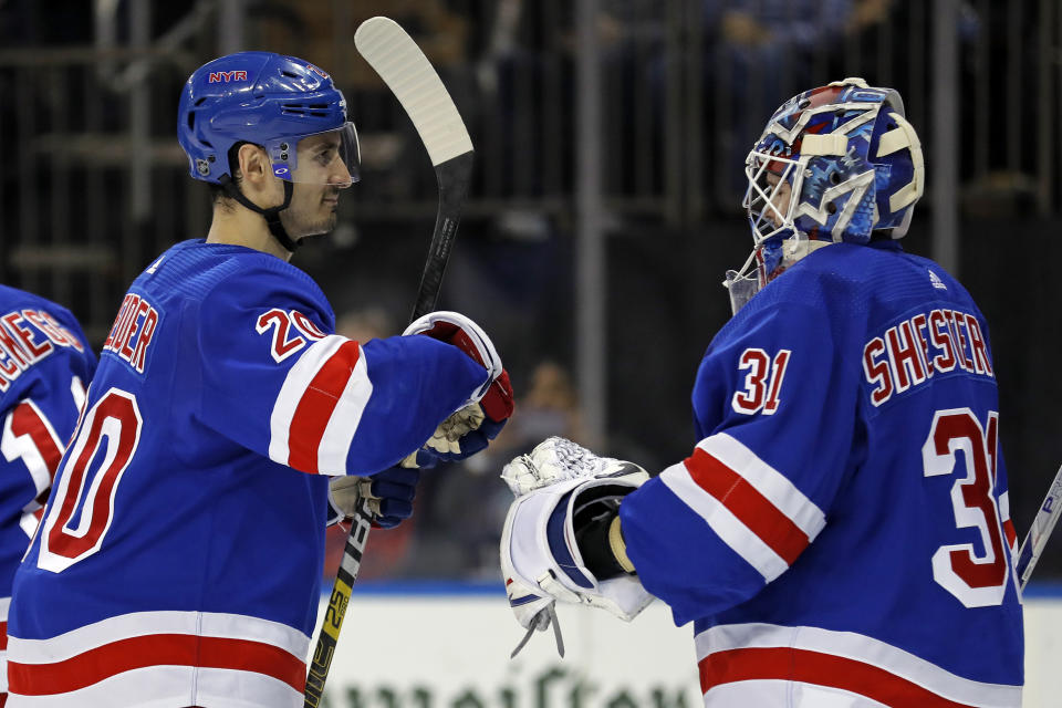 New York Rangers left wing Chris Kreider congratulates goaltender Igor Shesterkin (31) after defeating the Los Angeles Kings in an NHL hockey game Sunday, Feb. 9, 2020, in New York. The Rangers won 4-1. (AP Photo/Adam Hunger)