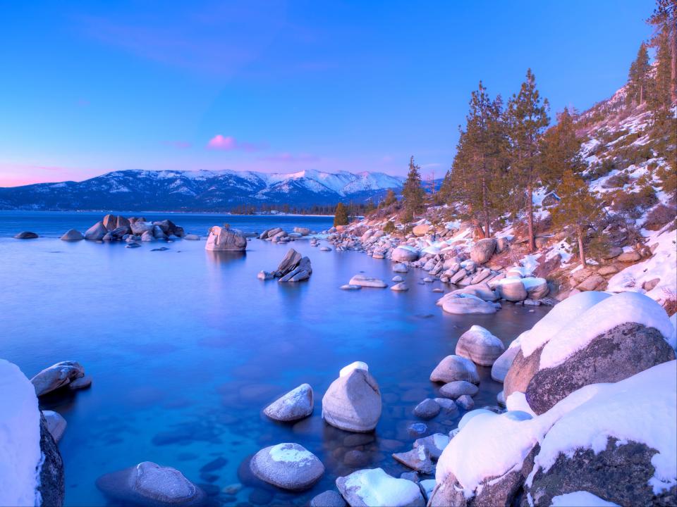 Boulders in Lake Tahoe at sunset.