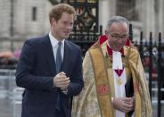 Britain's Prince Harry, left, walks with John Hall, Dean of Westminster Abbey to attend the Nelson Mandela memorial service at the Abbey in London Monday, March 3, 2014. Mandela the former president of South Africa died in December 2013. (AP Photo/Alastair Grant)