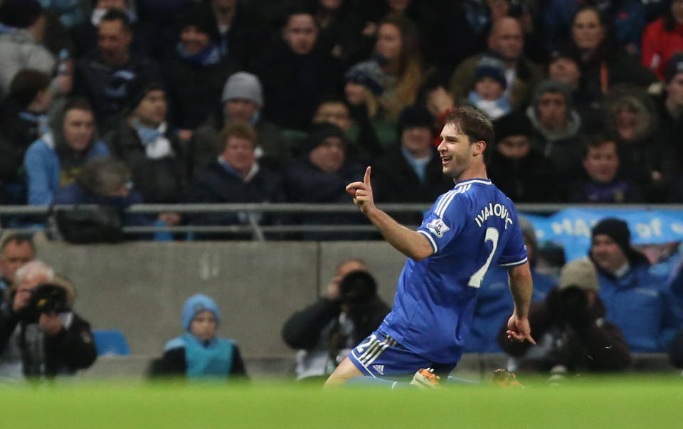 Chelsea's Branislav Ivanovic celebrates after scoring the opening during their English Premier League soccer match between Manchester City and Chelsea at the Etihad Stadium, Manchester, England, Monday, Feb. 3, 2014. (AP Photo/Jon Super)