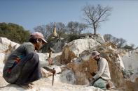 The Wider Image: From statues to toothpaste, the Myanmar village 'blessed' with marble bounty