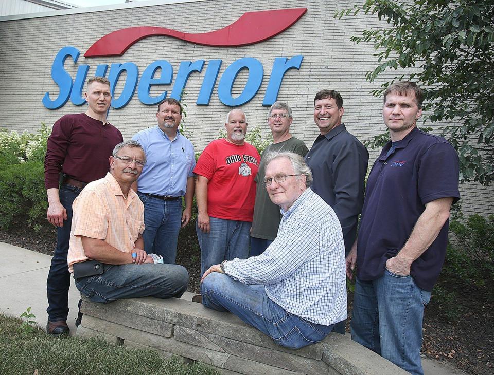 The Soehnlen family has owned and operated Superior Dairy since 1922 and five generations have been involved in the business. Daniel P. Soehnlen (seated right) is a member of the third generation and J.P. Soehnlen (left) is part of the fourth generation. Other fourth generation family members are (standing left to right) Dan Soehnlen, Al Soehnlen, Doug Soehnlen, Chris Soehnlen, Greg Soehnlen, and Emil Soehnlen. (Repository file photo)