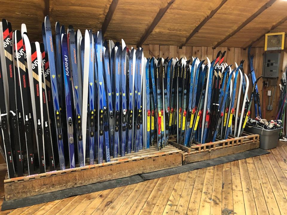 Rack of skis and Mansfield Outdoor Centre