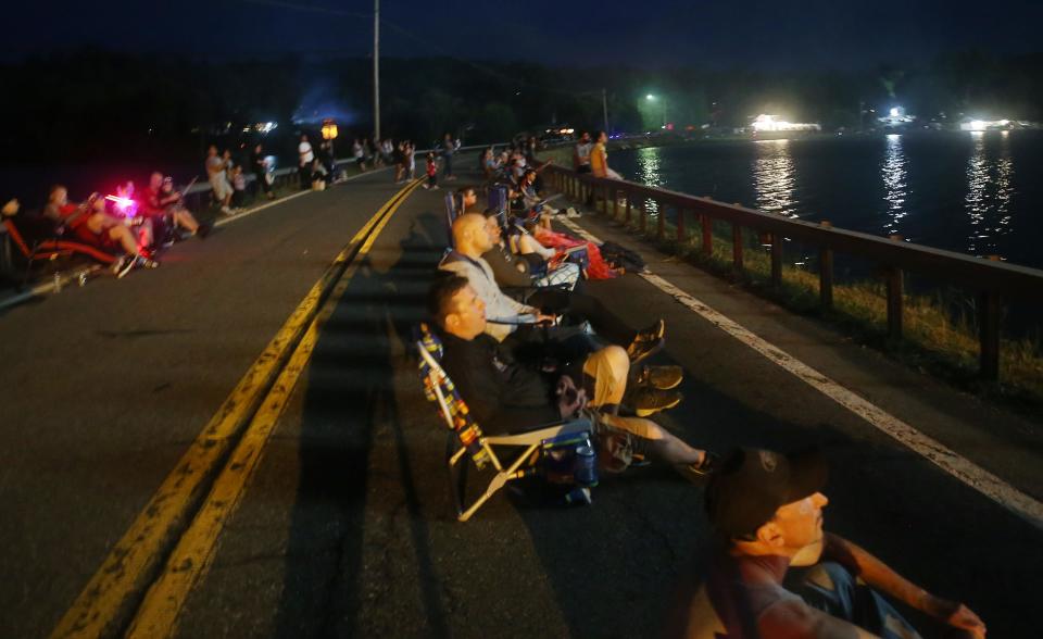 In this 2021 file photo, spectators enjoy the Town of Kent Independence Day fireworks display over Lake Carmel.