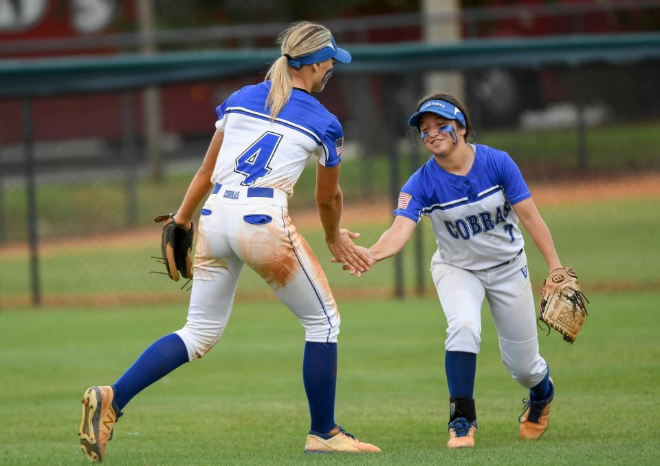 Illiana Hernandez and Karina Raider of Park Vista celebrate a nice play against Lake Brantley in the FHSAA state Class 7A softball semifinal Friday, May 27, 2022. Craig Bailey/FLORIDA TODAY via USA TODAY NETWORK