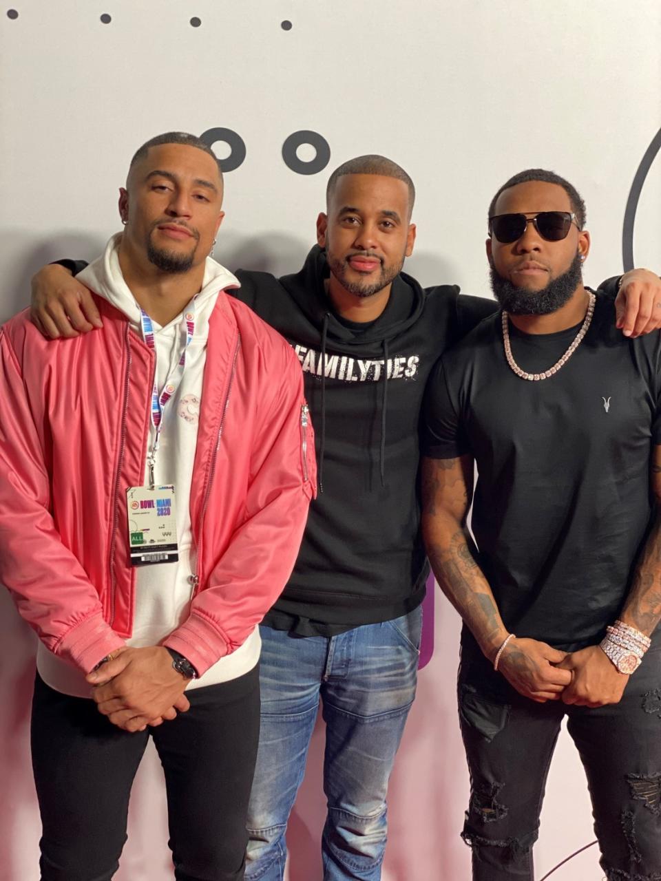 Titans safety Kenny Vaccaro, left, and Cardinals safety Budda Baker, right, flank agent. David Mulugheta.