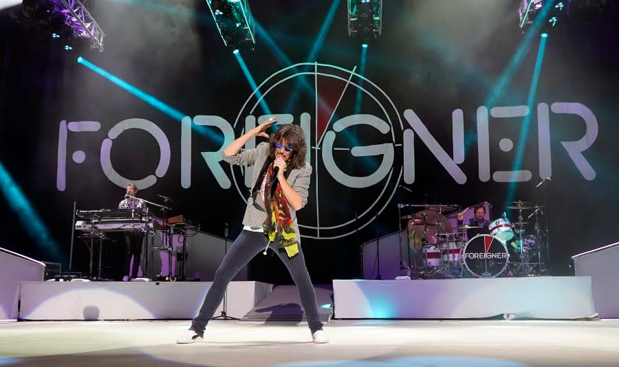 The British-American rock band Foreigner with keyboardist Michael Bluestein, lead vocalist Kelly Hansen and drummer Chris Frazier perform at the Blue Hills Bank Pavilion as part of The Juke Box Heroes Tour, Wednesday, June 20, 2018, in Boston. (Photo by Robert E. Klein/Invision/AP)