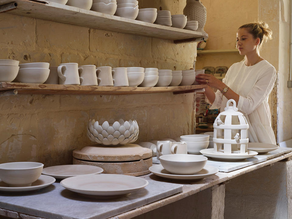 Sophie Edwards inside the pottery workshop she and her husband own on the villa’s grounds.