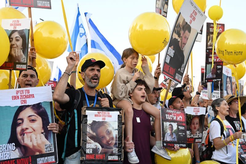 Tens of thousands of people join the families of hostages held by Hamas in Gaza as they enter Jerusalem on the fifth day of a march from Tel Aviv on Saturday. Photo by Debbie Hill/UPI