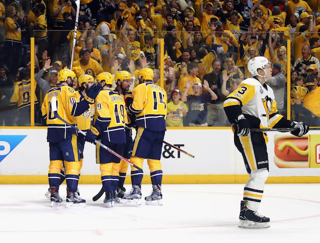 NASHVILLE, TN – JUNE 03: Roman Josi #59 of the Nashville Predators celebrates with teammates after scoring a second period goal against Matt Murray #30 of the Pittsburgh Penguins (not pictured) in Game Three of the 2017 NHL Stanley Cup Final at the Bridgestone Arena on June 3, 2017 in Nashville, Tennessee. (Photo by Bruce Bennett/Getty Images)