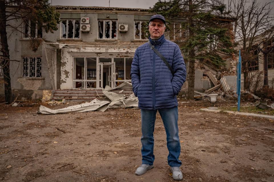 The mayor of Osokorivka stands outside the destroyed remains of his offices (Bel Trew)