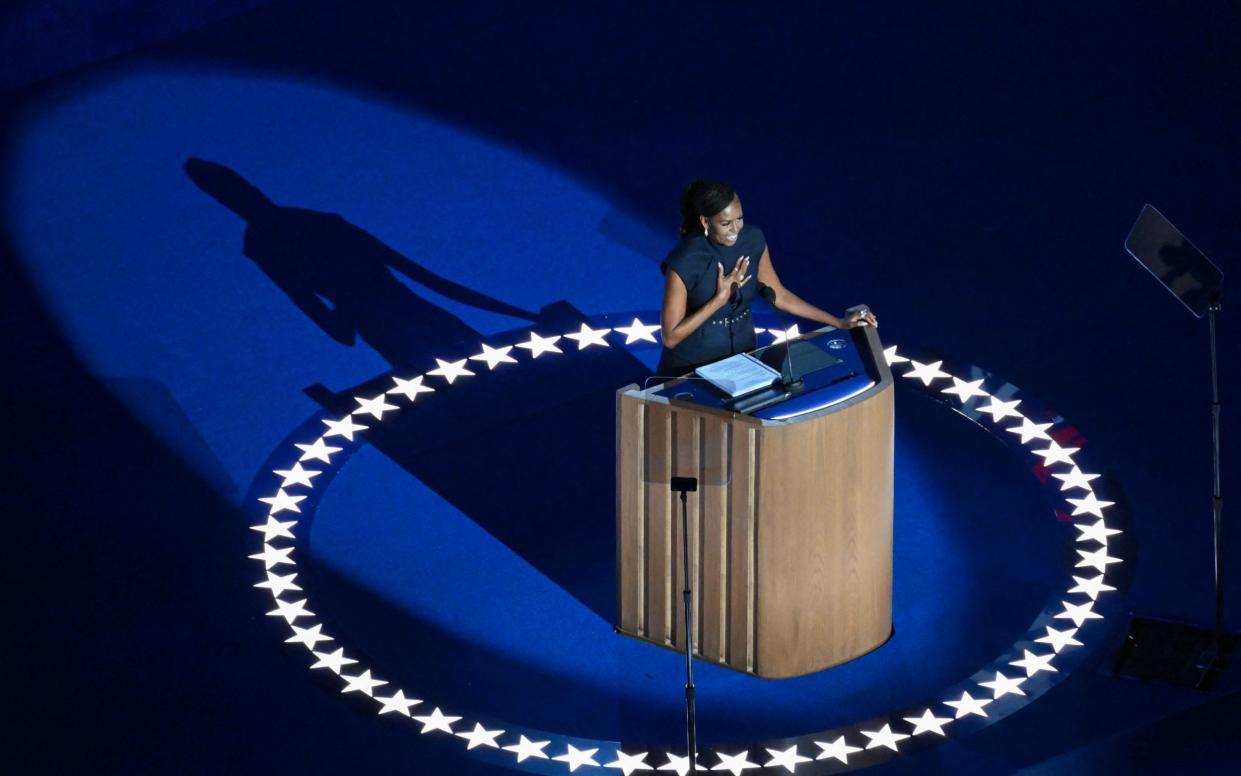 Former US First Lady Michelle Obama speaks on the second day of the Democratic National Convention