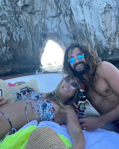 <p>Heidi Klum/Instagram</p> Heidi Klum wears animal-print swimsuit in Capri with husband Tom Kaulitz.
