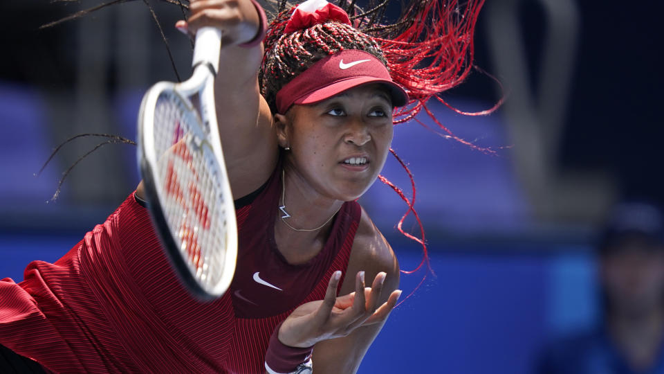 Naomi Osaka spoke with media after her first-round win at the Olympics. (AP Photo/Seth Wenig)