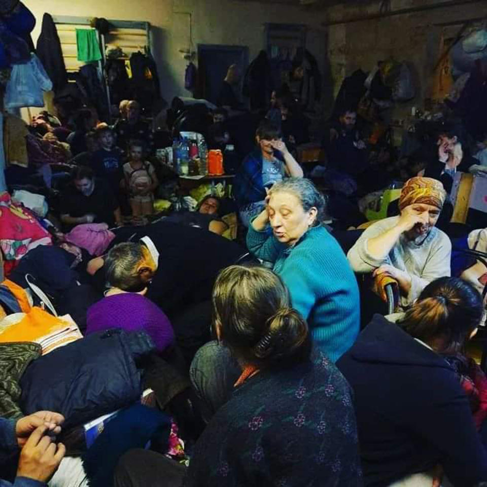 A photo of the town's citizens, held captive in the town's school's basement for weeks. There was barely enough room to stand, let alone sit or lay down. (Courtesy Tetyana Diohtyar)