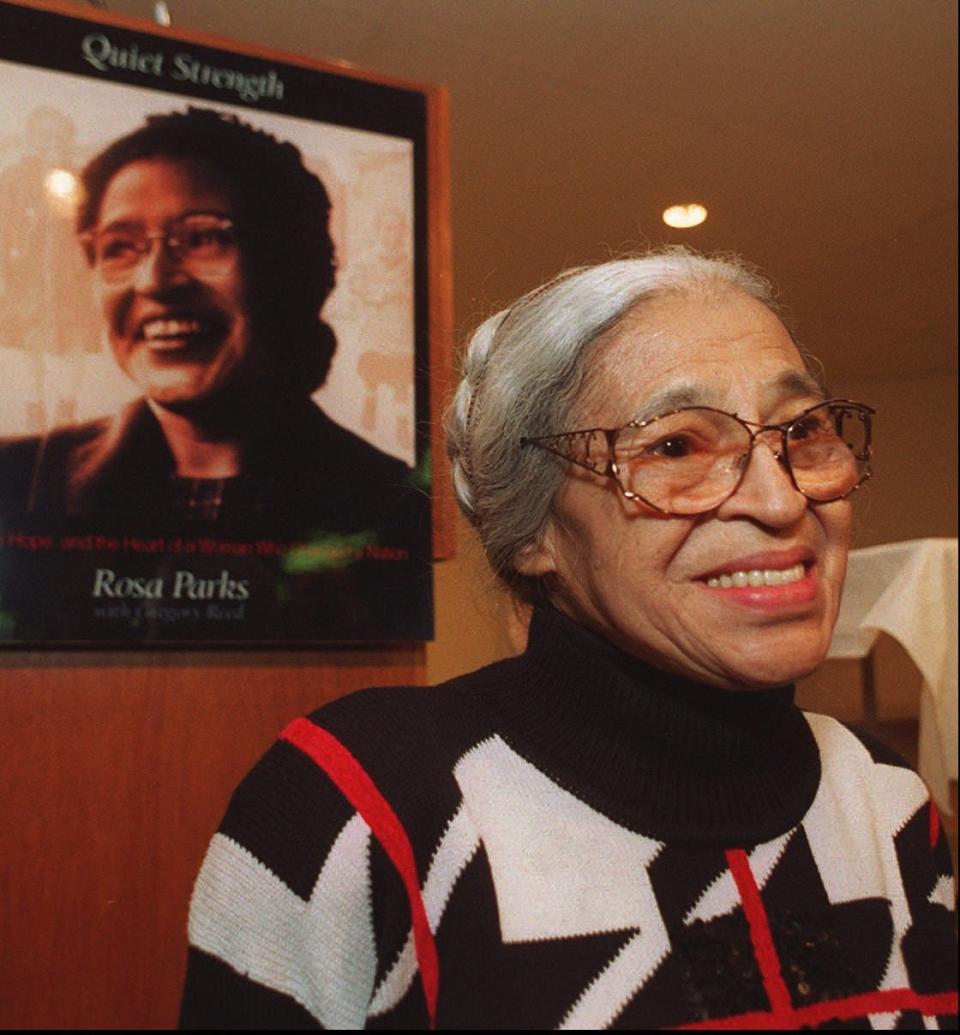 Civil rights pioneer Rosa Parks, 81, smiles while talking with a reporter after a news conference Thursday, Dec. 1, 1994. (AP Photo/Richard Sheinwald)