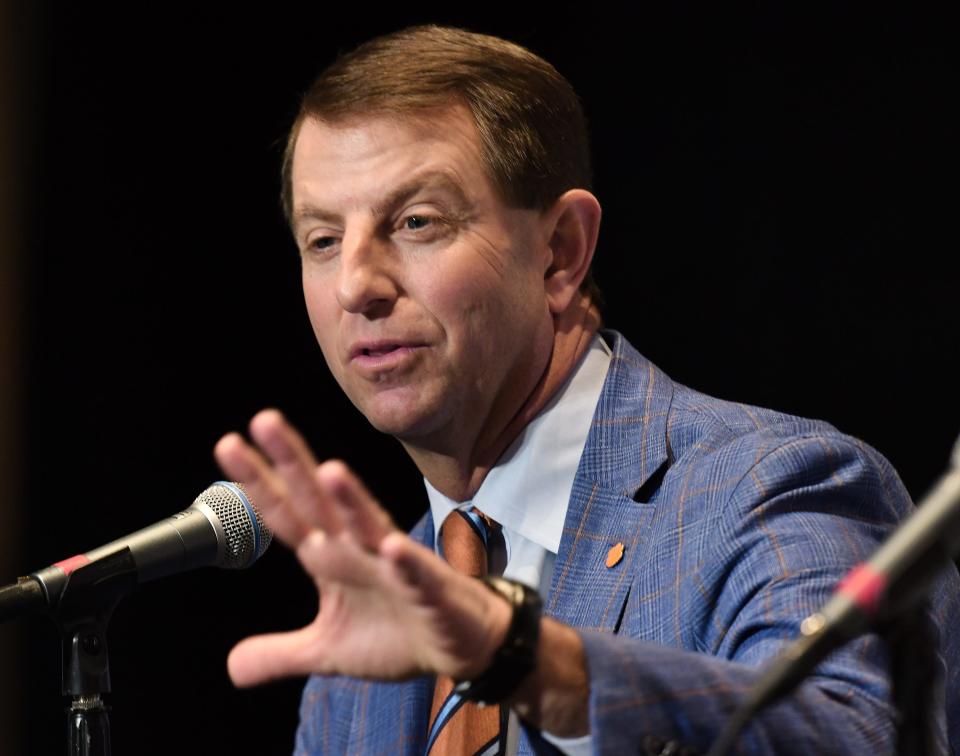 Clemson coach Dabo Swinney fields question from the media on Thursday in a news conference at EverBank Stadium on the eve of the TaxSlayer Gator Bowl.