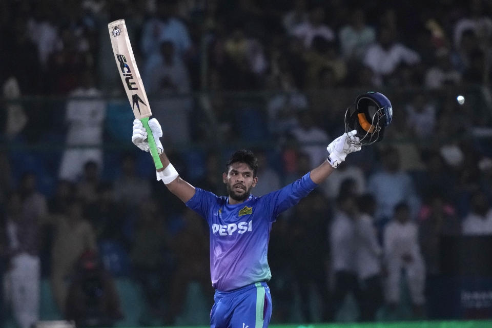 Multan Sultans' Usman Khan celebrates after scoring fifty during the final of Pakistan Super League T20 cricket match between Islamabad United and Multan Sultans, in Karachi, Pakistan, Monday March 18, 2024. (AP Photo/Fareed Khan)