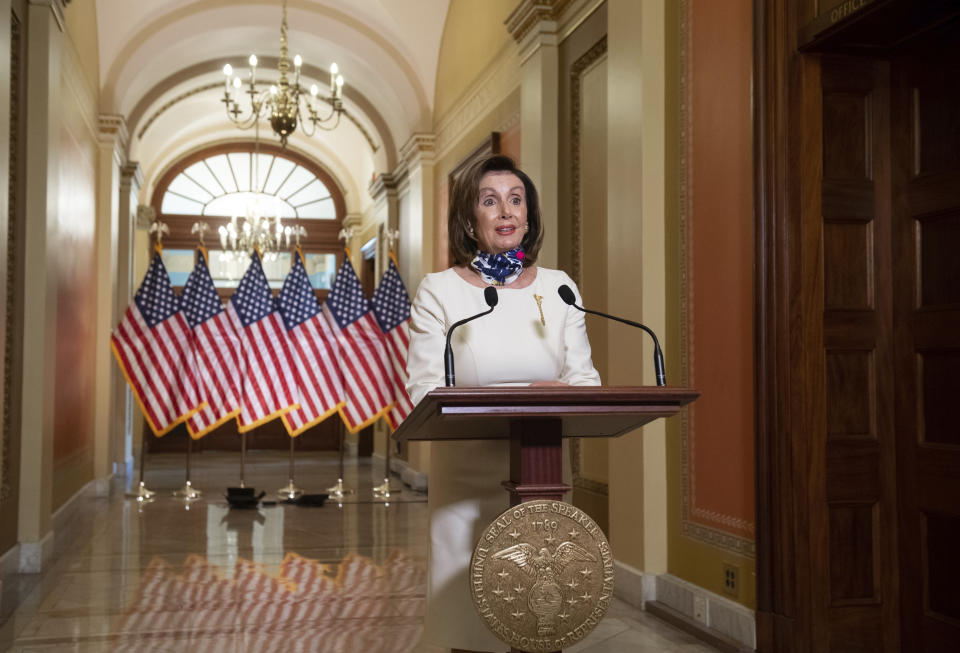 House Speaker Nancy Pelosi of Calif., speaks about the so-called Heroes Act, Tuesday, May 12, 2020 on Capitol Hill in Washington.  Pelosi unveiled a more than $3 trillion coronavirus aid package Tuesday, providing nearly $1 trillion for states and cities, “hazard pay” for essential workers and a new round of cash payments to individuals. (Saul Loeb/Pool via AP)